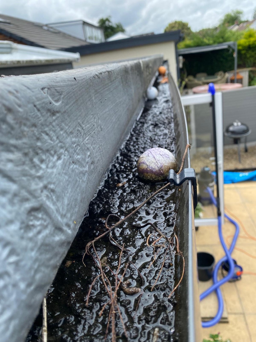 Gutter cleaning in Clayton-le-Moors - before