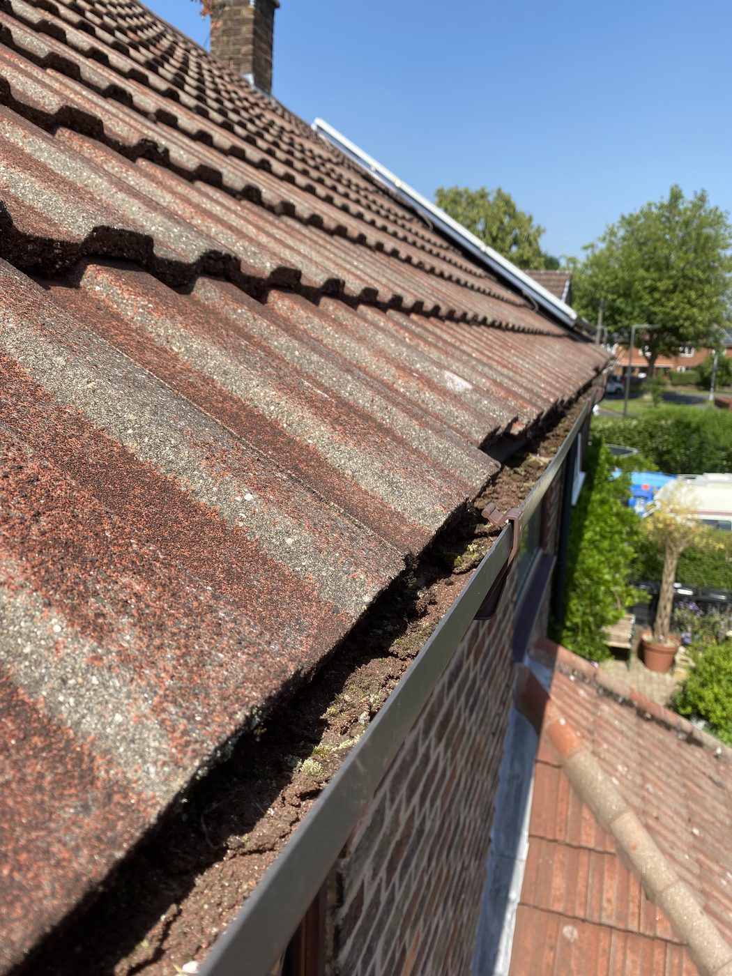 Gutter cleaning in Haslingden - before