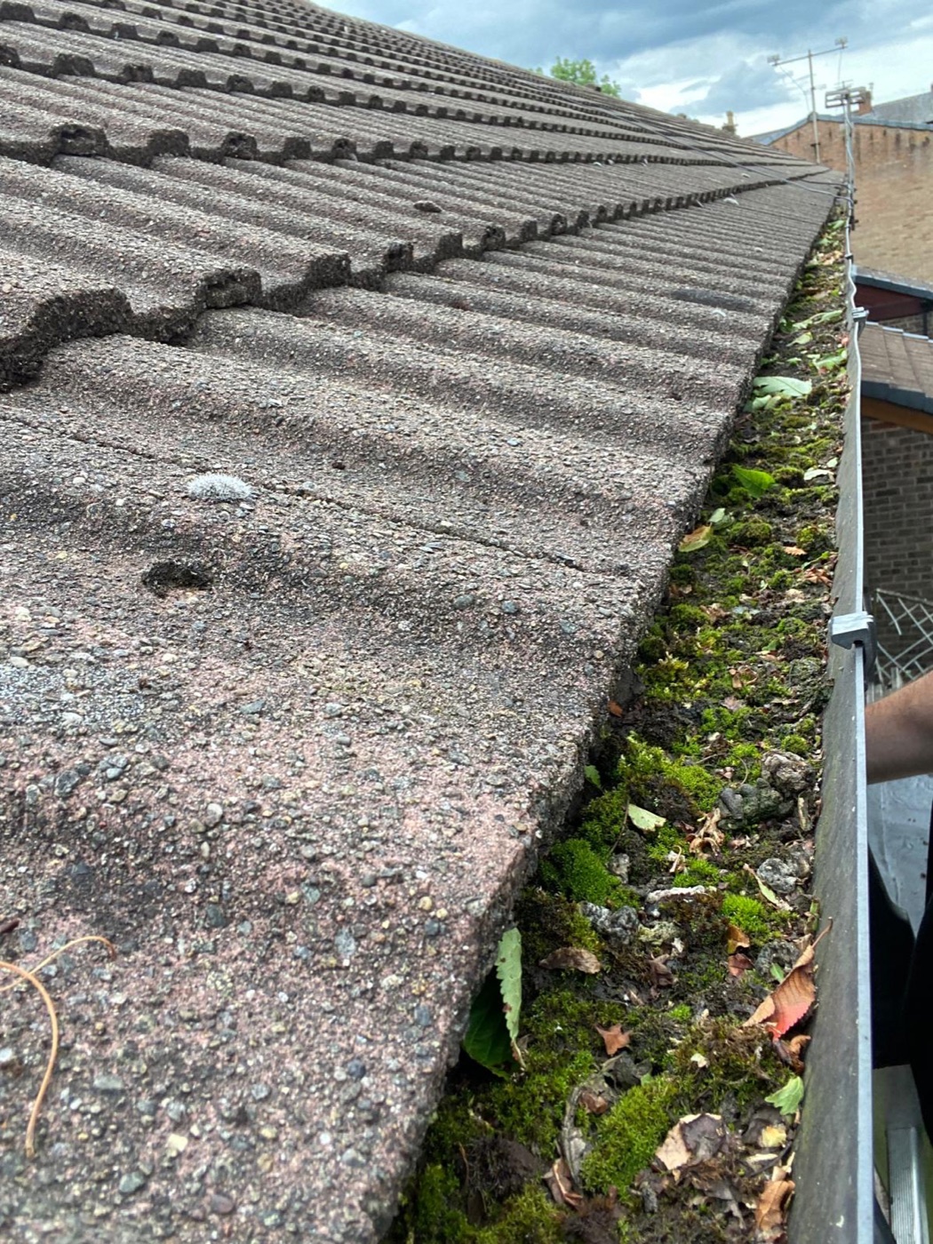 Gutter cleaning in Mellor - before